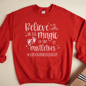 Believe In The Magic Of Tiny Mistletoes, Labor And Delivery Nurse Sweatshirt, L And D Nurse Christmas, Baby Nurse Holiday Crewneck, L&D Top