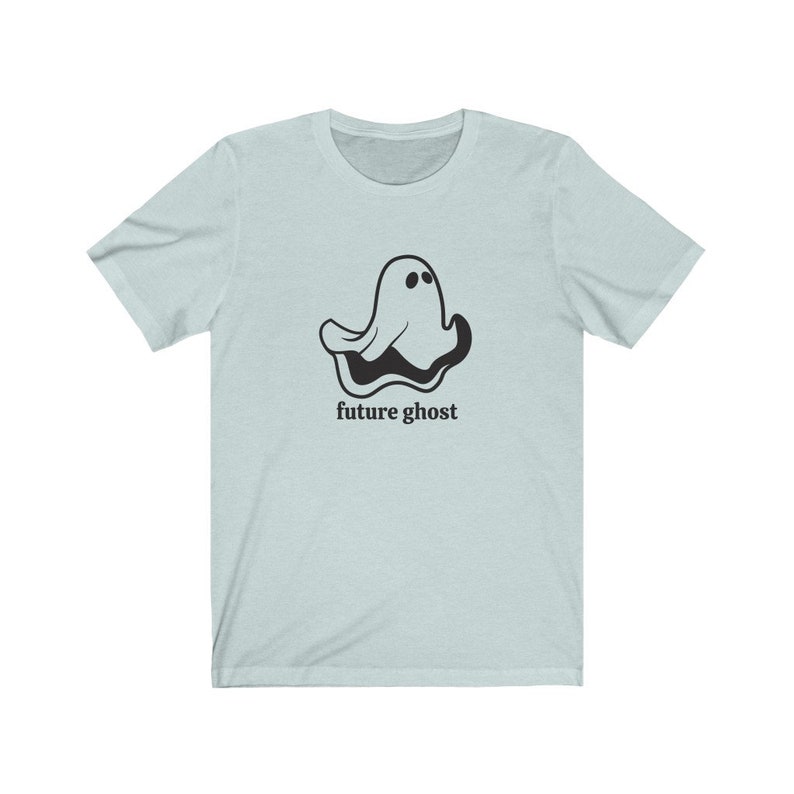 May include: A light blue t-shirt with a black cartoon ghost and the text "future ghost" printed on the front.