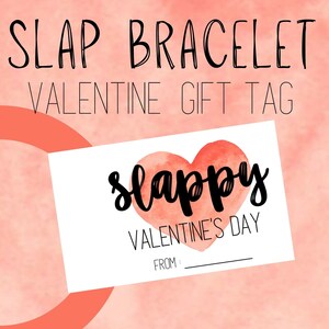 May include: A Valentine's Day gift tag with the words "Slap Bracelet" and "Valentine Gift Tag" in black script. The tag features a watercolor heart and the word "slappy" in script.