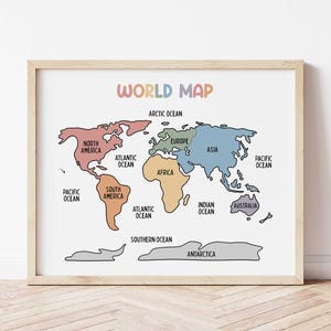 May include: A framed world map print with continents in various colors, including pink, orange, yellow, green, and blue. The map is labeled with the names of the continents and oceans. The words "WORLD MAP" are at the top.