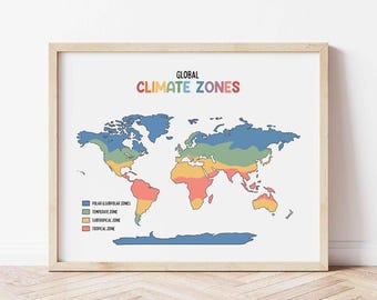 May include: A framed print of a world map illustrating global climate zones. The map is color-coded, with labels for polar, temperate, subtropical, and tropical zones. The text "GLOBAL CLIMATE ZONES" is displayed at the top in colorful letters.