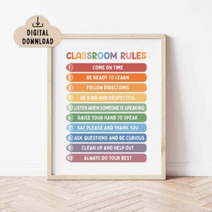 May include: A framed print displaying "CLASSROOM RULES" in colourful, rounded letters. Ten rules are listed below, each on a coloured bar, including "Come on Time" and "Always Do Your Best." A digital download icon is in the upper left.