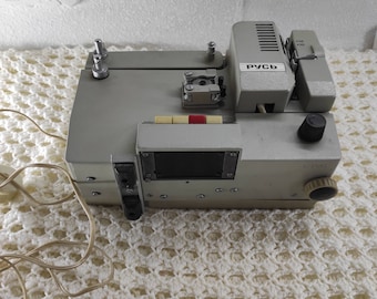 movie projector,projector,movie,film projector,vintage movie