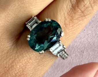 sterling silver oval-cut blue topaz ring size 9.75