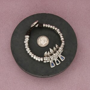uno de 50 silver plated blue crystal feathers leather bracelet size 7in image 2