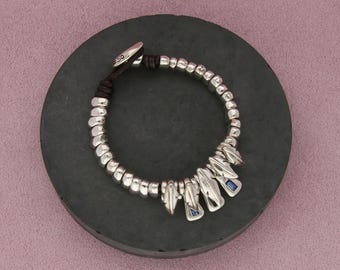 Uno de 50 versilberte blaue Kristall Federn Lederarmband Größe 18,5 cm