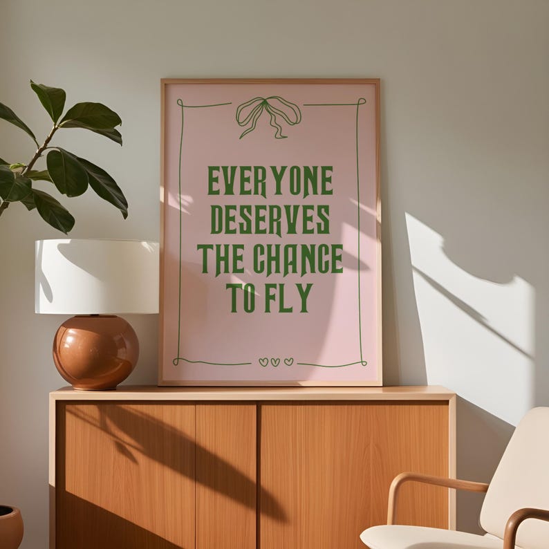 Trendy wall art with Wicked quote and Glenda and Elphaba design