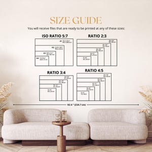 May include: A size guide chart with dimensions in inches and centimeters, including ISO Ratio 5:7, Ratio 2:3, Ratio 3:4, and Ratio 4:5. The text reads "You will receive files that are ready to be printed at any of these sizes:" The image is displayed above a beige sofa.