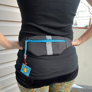 Cintura da corsa nera riflettente per donne e uomini / Fanny piatto per allenamenti, lavori di jogging / Custodia per cellulare impermeabile adatta per Iphone Android