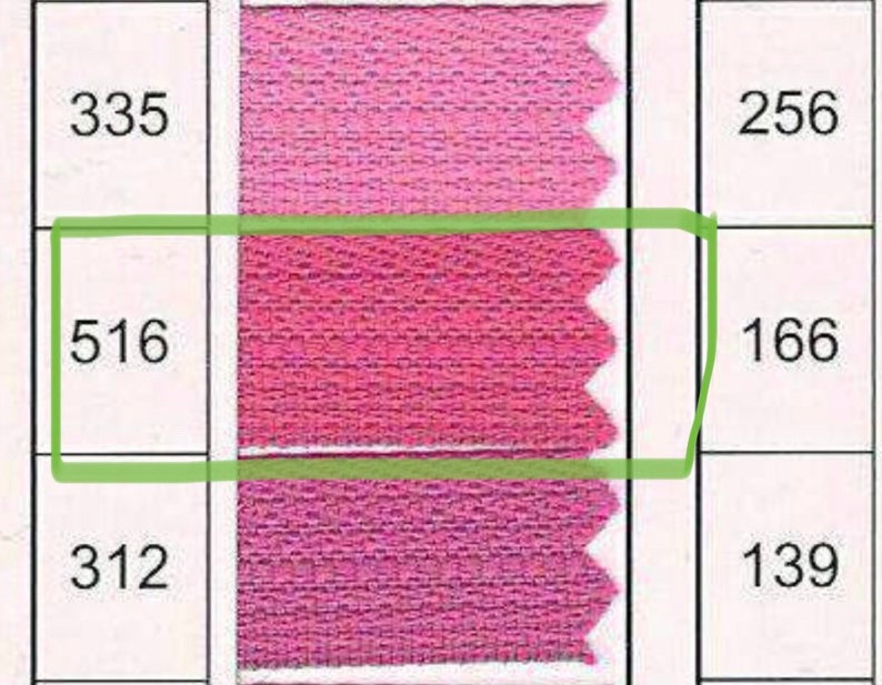 May include: A pink fabric swatch with three different shades of pink. The numbers 335, 516, 312, 256, 166, and 139 are printed on the fabric swatch.