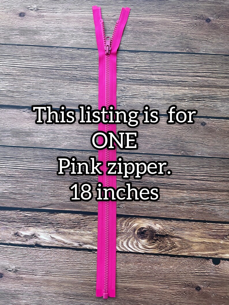 May include: A pink zipper measuring 18 inches long. This listing is for one zipper.