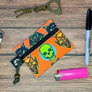 May include: A set of three ceramic mugs with a speckled, matte finish. The mugs are in shades of cream, light gray, and dark gray. Each mug has a simple, minimalist design, perfect for coffee or tea.