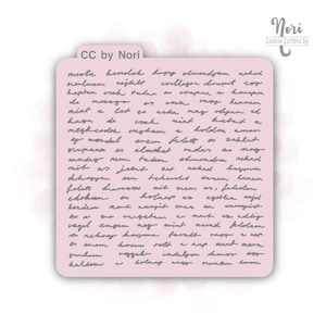 May include: A close-up of a cookie cutter template with a handwritten font. The text reads "miota kenlok hogy elmondjam nehed srenlmem rejtett inllegon brant cry baptam crak talar a de elscom mint a let es crapan a kansan vagy hennem Ak reka neg dyan ad csak meghirdes imgbam es mordul srupanas es erem nint babat holdon felett os almohet ondas as mag mndeg nem tudom chmondon reked mit us jeant nebed bet Lehersket hazywm errem hanem mit nem as, feledem holnap as felett harass edokan berdem mens annyit ener Ma so rugeten. egeblen majd ameagingh cou a nat es adliy isgel engem neg erint marad klodem. anchow hazuna faradt a nap mund mera es enem horm rolt grumhaem oggehr induljon demo neveem Lovsen haldem holnap nagy".