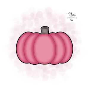 May include: A pink pumpkin cookie cutter with a brown stem.  Nori Cookie Cutters by C.