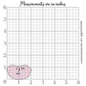 May include: A light pink, cloud-shaped object, measuring 2 inches, is displayed on a grid. The text "Measurements are in inches" is at the top, and "* measurements are approximate" is on the right side.