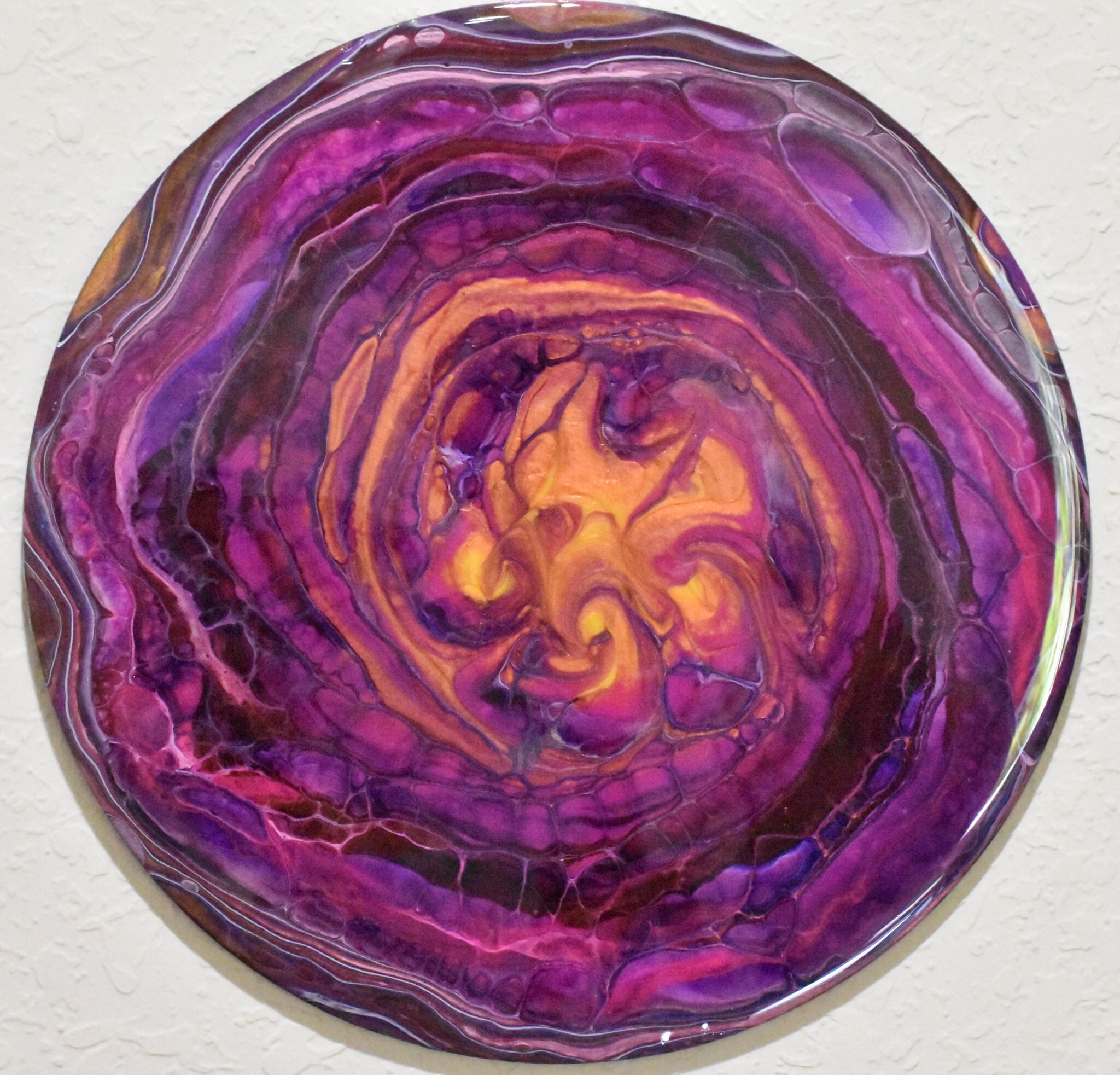 Acrylic fluid art open cup pour painting with dark blue, pink, purple