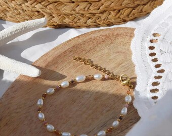 Pulsera de mujer con perla de agua dulce y piedra natural.