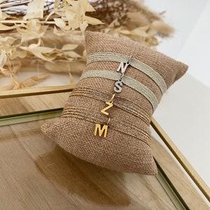 Elastic ribbon bracelet and initial
