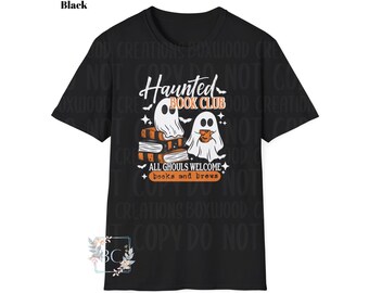 May include: Black t-shirt with a Halloween-themed graphic. The design features two cartoon ghosts, books, and the text "Haunted Book Club." The phrase "All Ghouls Welcome, books and brews" is also included.