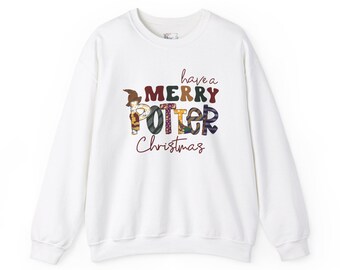 May include: White crew neck sweatshirt with the text "have a MERRY POTTER Christmas" in a mix of colors and fonts. The word "POTTER" is in a plaid pattern. The sweatshirt is a festive holiday item.