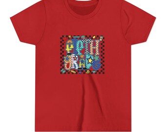 May include: Red t-shirt featuring the words "FIFTH GRADE" in a colorful, playful design. The text is set against a black and white checkered background, with various school-themed illustrations.