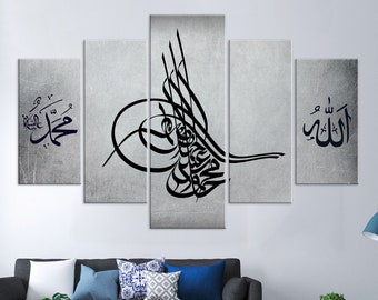 May include: A five-piece canvas wall art set featuring black Arabic calligraphy on a gray background. The calligraphy reads "Allah" and "Muhammad".