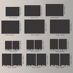 May include: A chart showing different sizes of black canvas prints in inches and centimeters. The chart shows the dimensions of the canvas prints in both inches and centimeters. The chart is organized by the size of the canvas print, with the smallest size at the top and the largest size at the bottom.