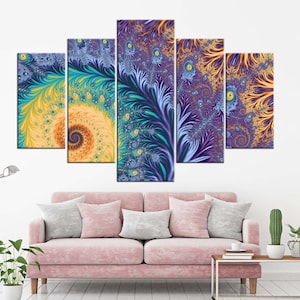 May include: Five-panel wall art featuring abstract fractal designs in shades of teal, purple, and gold. The artwork is displayed above a pink sofa with gray pillows, creating a modern and colorful living room scene.