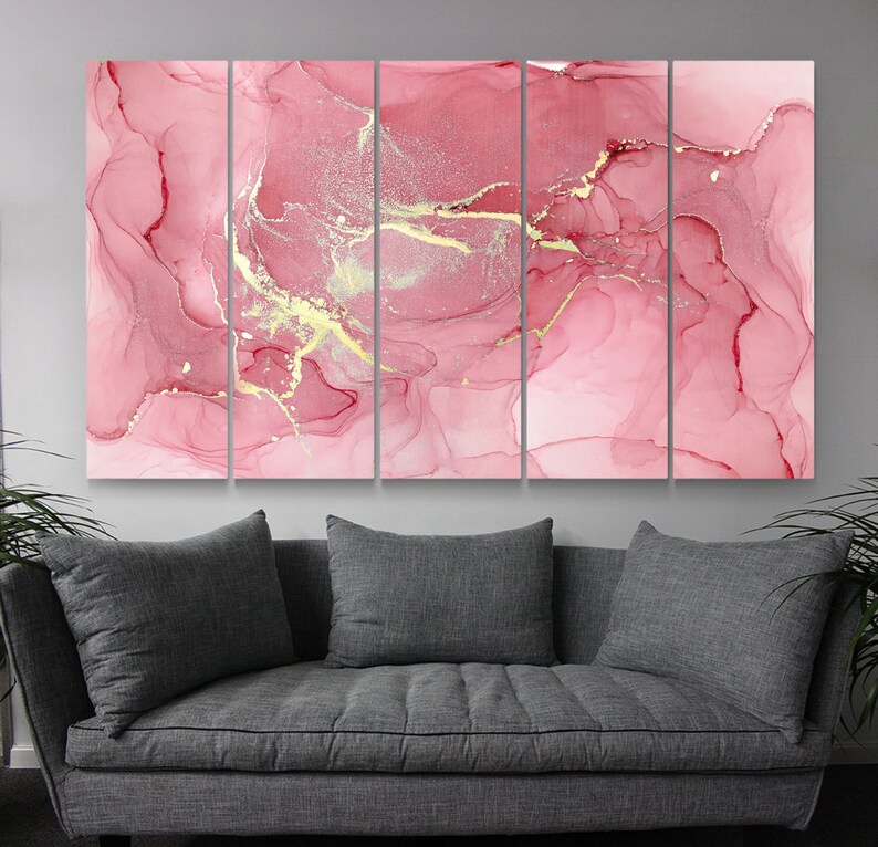 May include: Abstract art print with a pink and gold color scheme. The print is divided into five panels, each featuring a swirling, marbled pattern with gold accents.