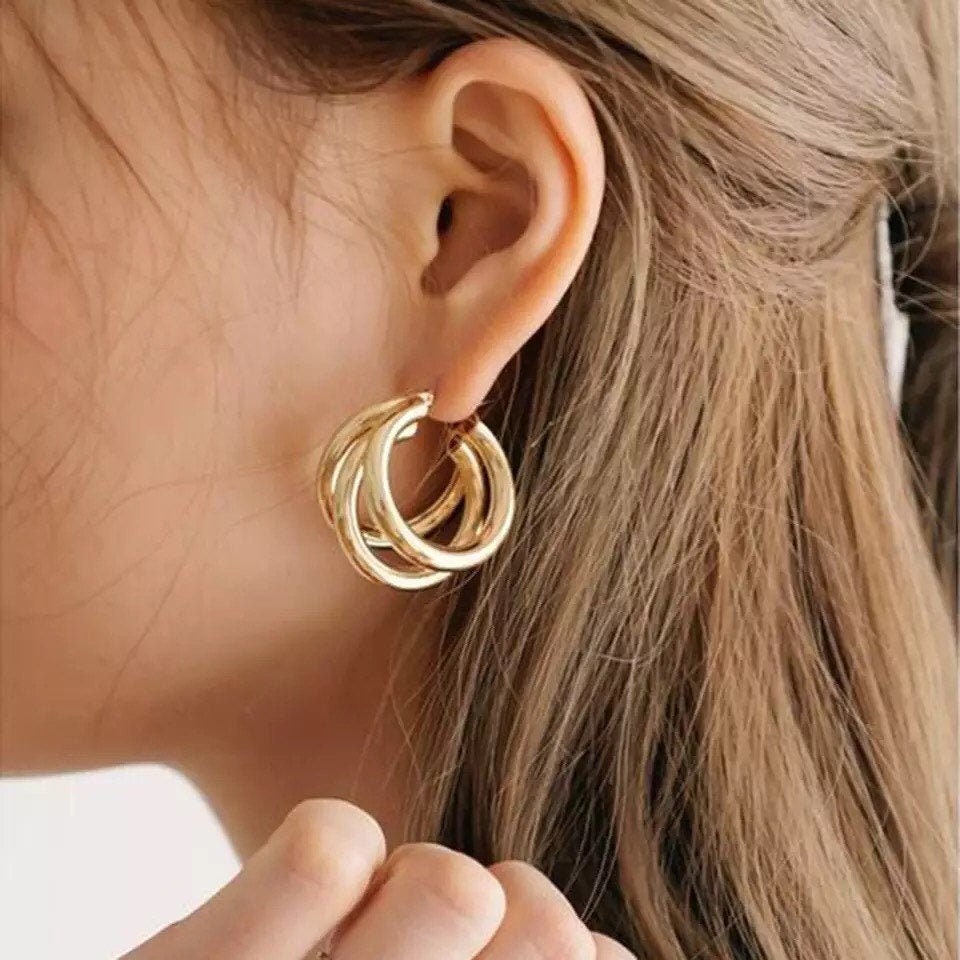 Modern gold hoop earrings discount