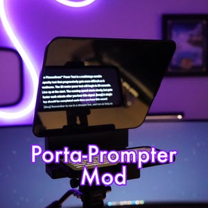 May include: A black Porta-Prompter Mod with a small screen displaying text. The text reads "A "Placebo" "Power Test" is a multistage cardio agility test that progressively gets more difficult as it continues. The 30-meter power test will begin in 30 seconds. Line up at the start. The running speed starts slowly, gets faster each minute after you hear this signal.  Sound a single beep should be completed each time your hear the signal.  [Signal] Remember to run in a straight line, and run on as long as..."