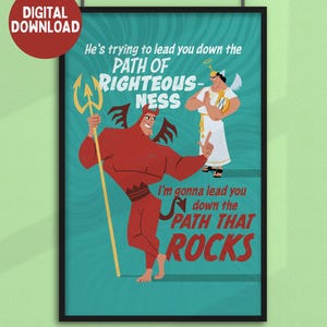 May include: Framed digital download art print featuring a devil and an angel. The devil, in red, holds a trident and the text reads "I'm gonna lead you down the path that rocks." The angel is in white. The text also reads "He's trying to lead you down the path of righteousness."