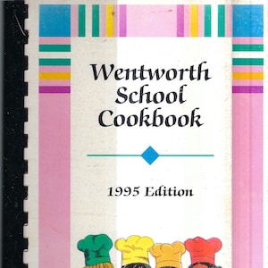 May include: A pink and white cookbook cover with a colorful striped border. The title is "Wentworth School Cookbook" with the text "1995 Edition" below. Four children wearing chef hats are pictured at the bottom of the cover.