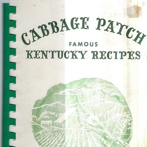 May include: A vintage cookbook cover featuring a green and white illustration of a cabbage patch. The title reads "Cabbage Patch Famous Kentucky Recipes" and the bottom of the cover says "Louisville, Kentucky".