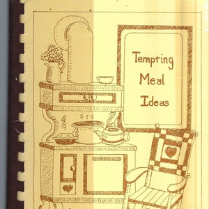 May include: A vintage-style illustration of a kitchen with a wood-burning stove, a rocking chair, and a cat. The text "Tempting Meal Ideas" is written on a sign above the stove. The text "TMI Women's Group" is written at the bottom of the image.