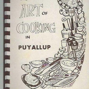 May include: A black and white illustration of a cookbook cover with the title "The Art of Cooking in Puyallup" and a drawing of various kitchen utensils and food items.