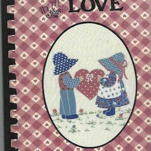 May include: A pink and white checkered background with the text "Seasoned With Love" in black. Two children, one wearing a blue and white polka dot dress and the other wearing blue jeans and a blue and white polka dot hat, are holding a red heart with a white bow. The text "Middle Creek Church of God" and "Afton, Tennessee" is at the bottom of the image.