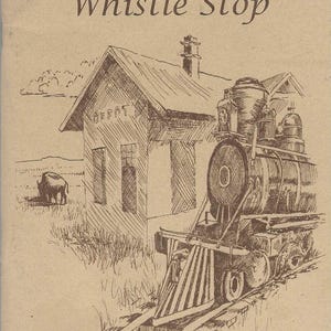 May include: An illustration of a vintage train and depot, with the text "Wyoming Whistle Stop." The artwork is in sepia tones, depicting a steam engine on tracks, a building labeled "Depot," and a bison in the background. Additional text includes "Western Wit" and "Tall Short Tales."