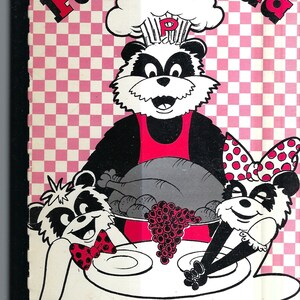 May include: A pink and white checkered background with a cartoon panda wearing a chef's hat and apron. The panda is holding a large pot with a turkey, potatoes, and grapes. Two smaller pandas are sitting at a table with plates. The text "Park Panda Kitchen Cookbook" is at the bottom of the image. Park Elementary School - Munhall, PA.