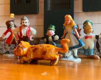 Marx 1960s Disneykins. Alice in Wonderland, Jose Caricoa, Captain Hook, Geppetto, Jiminy Cricket, and RARE Marx Baby Puss from Flintstones.