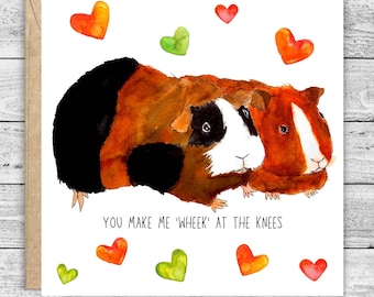 May include: A Valentine's Day card featuring a watercolor illustration of two guinea pigs cuddling. The card has a white background with red, orange, and green hearts and the text "You make me 'wheek' at the knees."