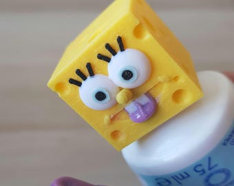 Zahnpasta-Aufsatz in SpongeBob-Optik – ein lustiger Zahnpasta-Spender für Kinder! Perfektes Geschenk! Inklusive 3D-Zahnpasta-Quetschfunktion und 2 Adaptern.