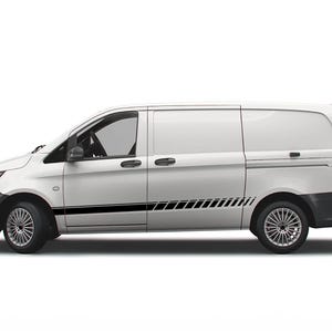 May include: White van with black racing stripes along the side. The van has a sliding door on the passenger side and a rear door.