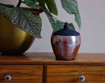 Small copper ceramic trinket box, black matte lid and shiny earthenware glaze body on handmade pottery