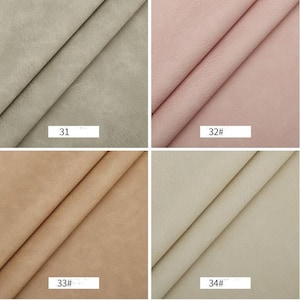 May include: Four fabric swatches in different colors: light gray, light pink, light brown, and light beige. The swatches are labeled with numbers 31, 32, 33, and 34.
