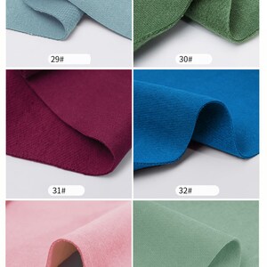 May include: Six fabric swatches in different colors, including light blue, green, burgundy, blue, pink, and sage green. Each swatch is labeled with a number, from 29 to 34.