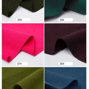 May include: Six fabric swatches in different colors. The swatches are arranged in two rows of three. The colors are: dark green, teal, pink, burgundy, olive green, and dark blue. Each swatch has a number printed on it: 35, 36, 37, 38, 39, and 40.