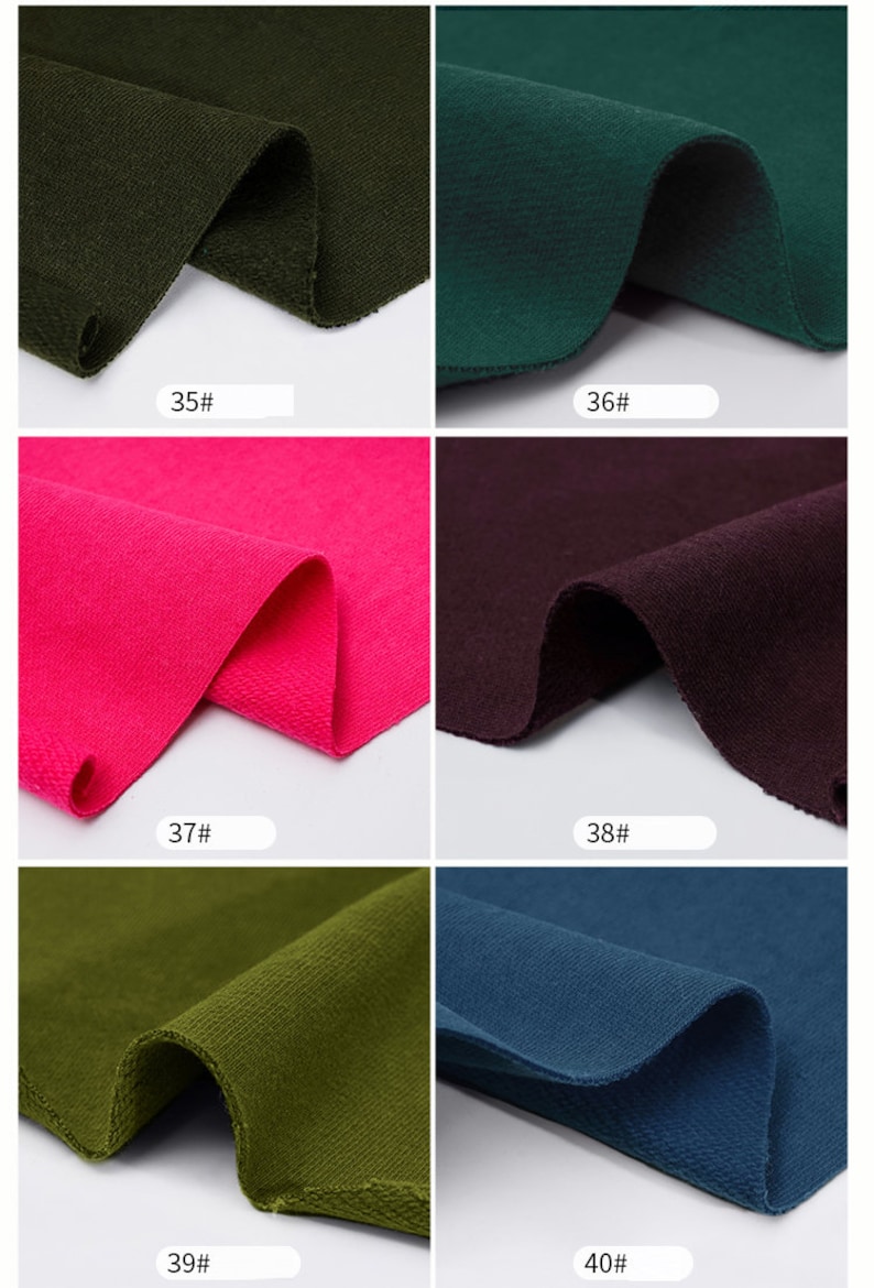 May include: Six fabric swatches in different colors. The swatches are arranged in two rows of three. The colors are: dark green, teal, pink, burgundy, olive green, and dark blue. Each swatch has a number printed on it: 35, 36, 37, 38, 39, and 40.