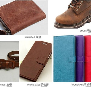 May include: A set of four leather phone cases in blue, purple, red, and white. The cases have a textured leather finish and a flap closure. The cases are arranged in a row from left to right.