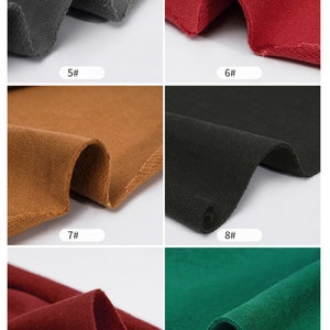 May include: Close-up of six different fabric swatches in various colors, including gray, red, brown, black, burgundy, and green. Each swatch is labeled with a number, from 5 to 10.
